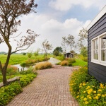 Fotoreportage van tuin in Snelrewaard voor Groenregie